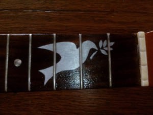 incrustation ukulele aluminium