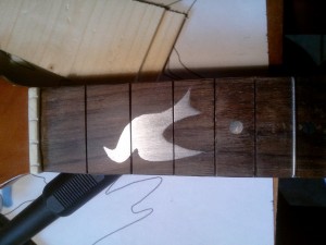incrustation ukulele aluminium